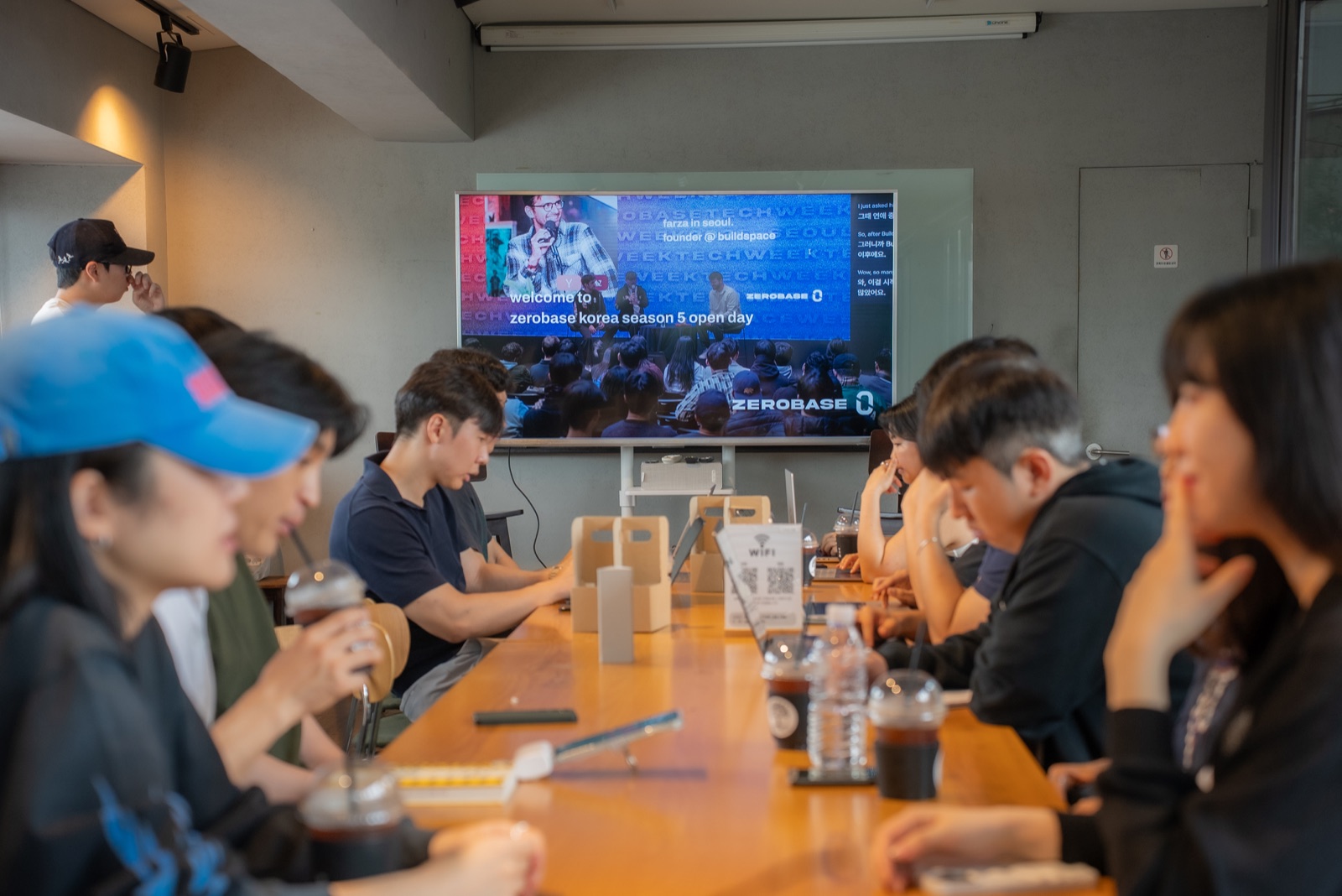 Founders working together around a table at Zerobase.
